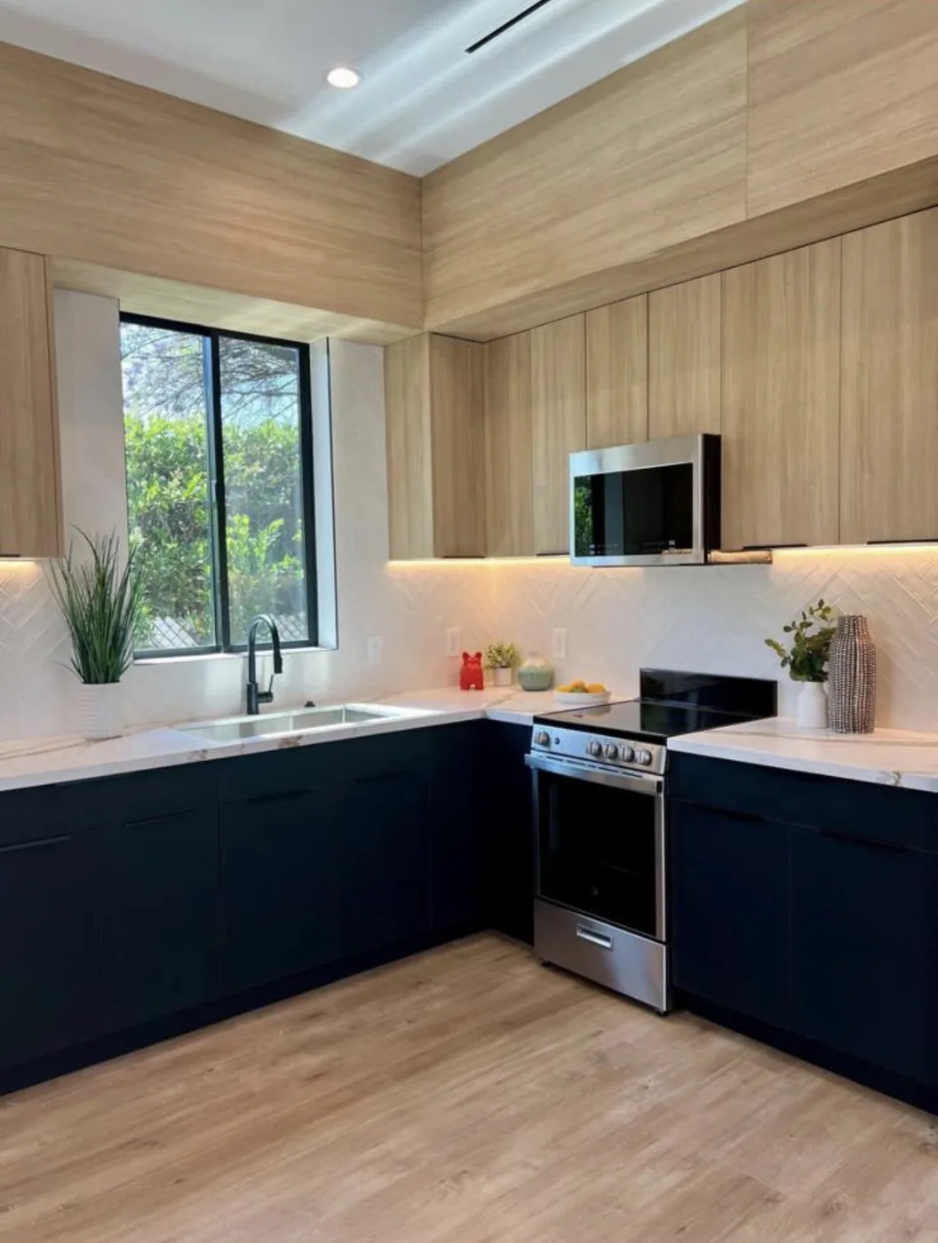 Chef's kitchen in navy + oak